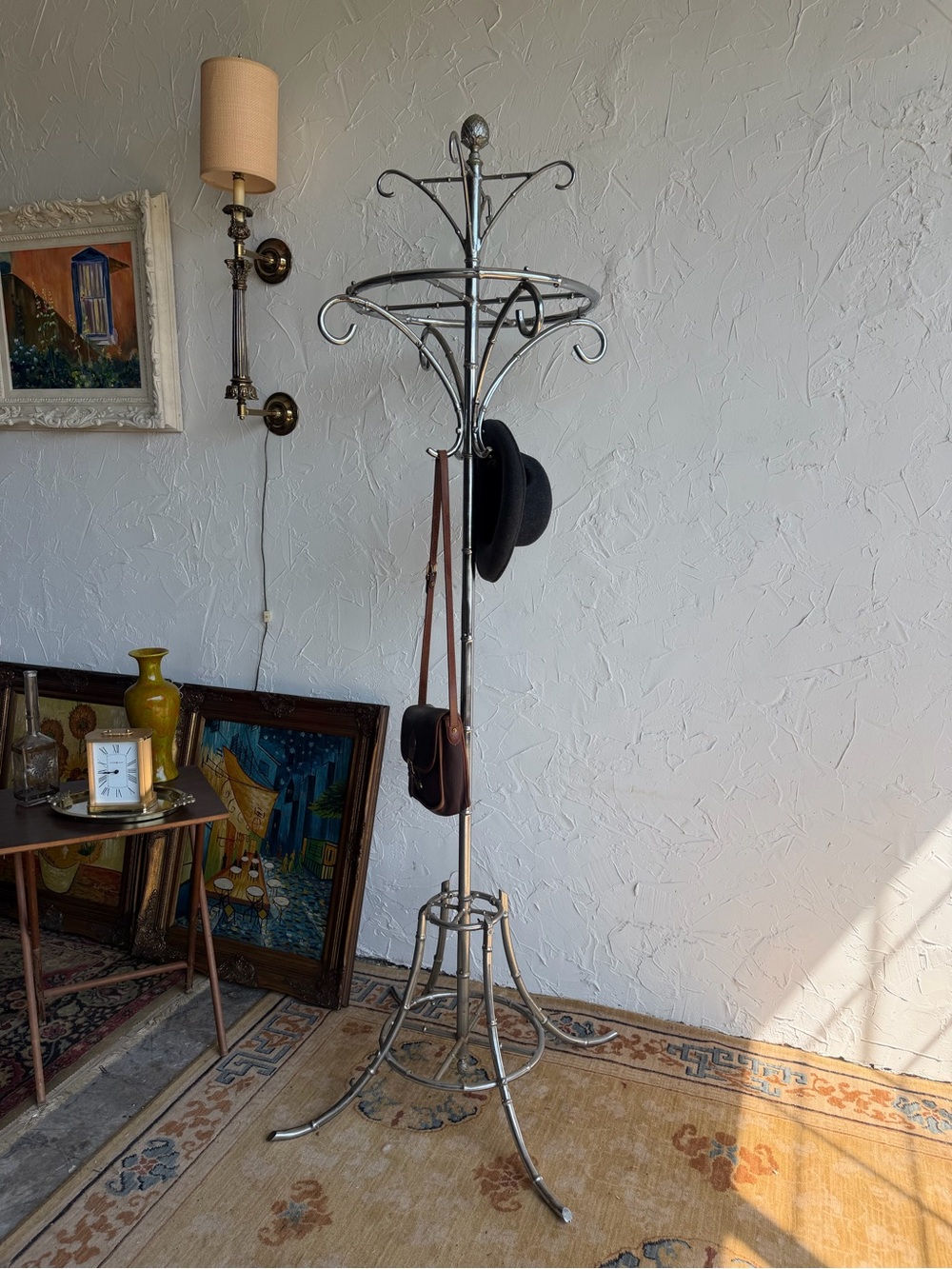 vintage silver-toned metal coat stand featuring a distinctive bamboo-style frame